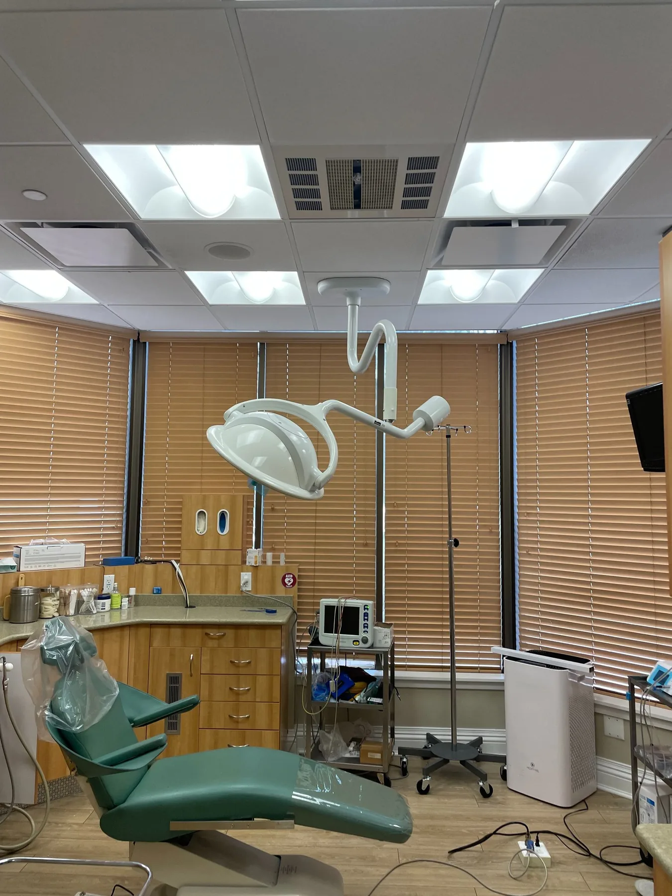 A dental exam room with new ceiling lighting